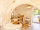 Trullo della Quercia. Cucina all'aperto, vicino le spiagge.