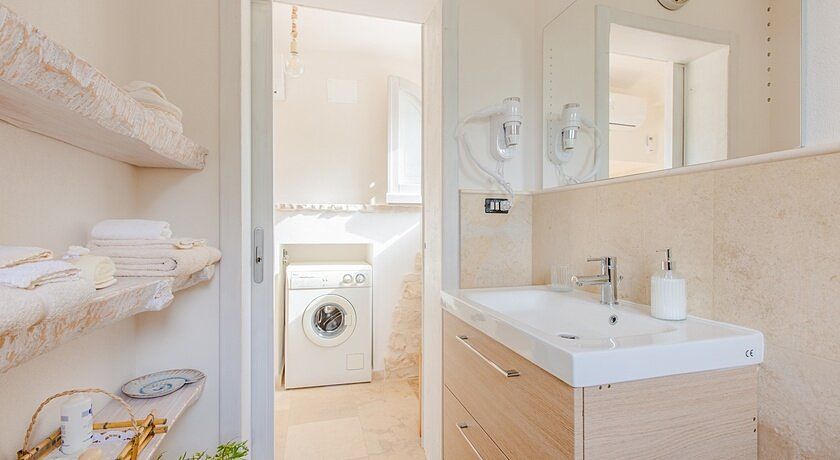 Trullo della Quercia. Cucina all'aperto, vicino le spiagge.