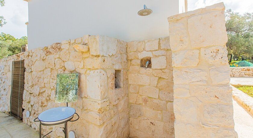 Trullo della Quercia. Cucina all'aperto, vicino le spiagge.